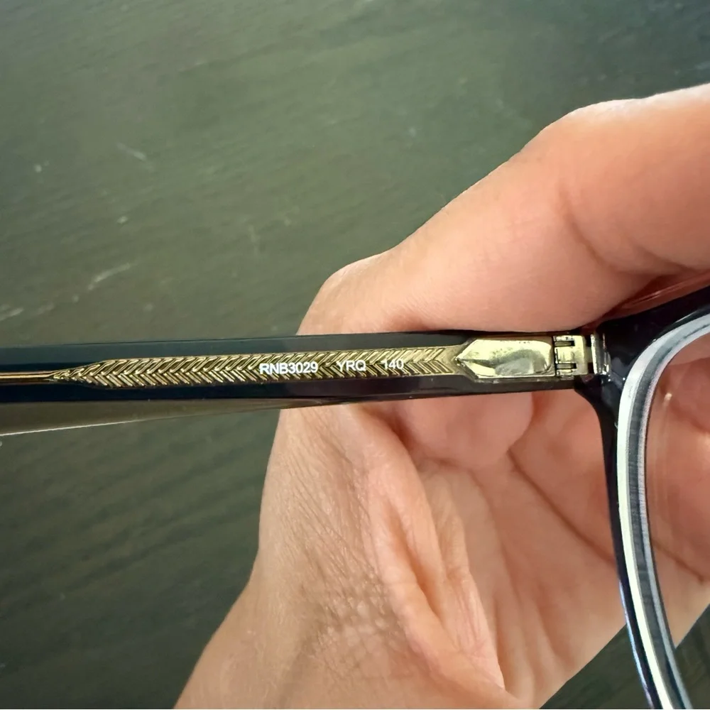 Rag & Bone eyeglasses with a black frame RNB3029 YRQ 140